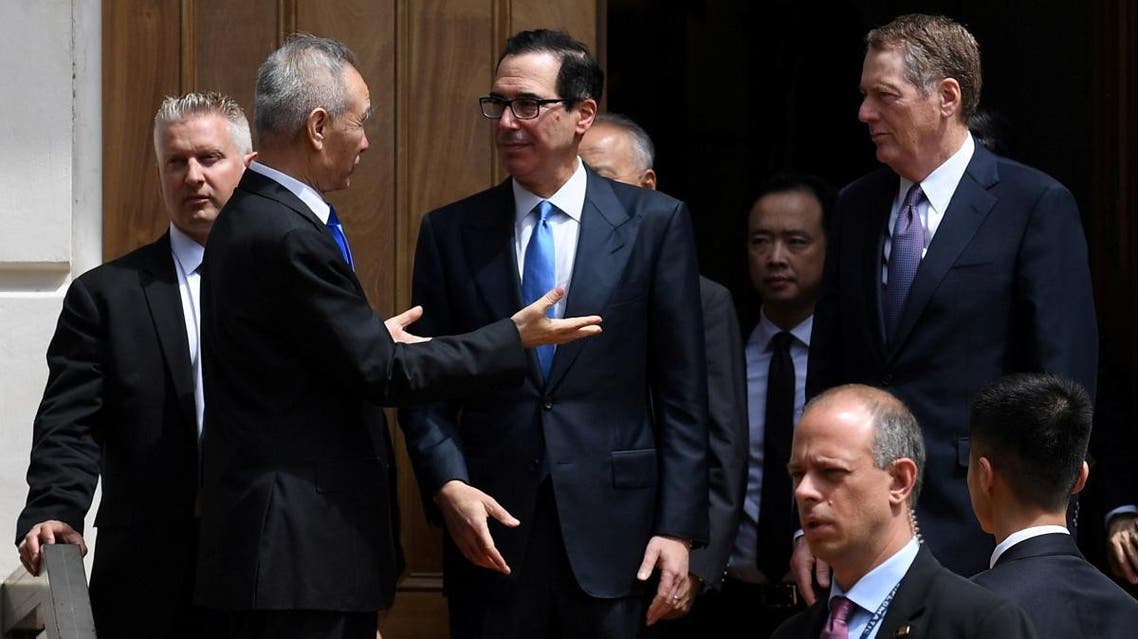 Chinese Vice Premier Liu He talks with US Treasury Secretary Steven Mnuchin and Trade Representative Robert Lighthizer as he leaves trade talks in Washington, on May 10, 2019. (Reuters)