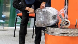 Pakistanis angered by new airport baggage-wrapping policy
