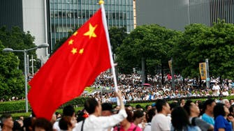 China approves amendments outlawing insulting national flag