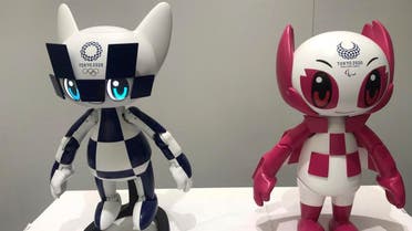Robots of mascots of Olympics “Miraitowa,” left, and Paralympics “Someity” are shown to the media at Toyota Motor Corp. headquarters in Tokyo. (AP)