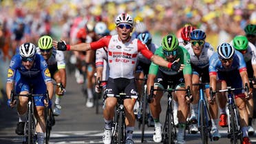 Lotto Soudal rider Caleb Ewan of Australia wins the stage ahead of Deceuninck-Quick Step rider Elia Viviani of Italy. (Reuters)
