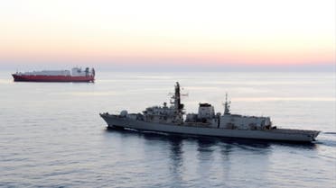In this image from file video provided by UK Ministry of Defence, British navy vessel HMS Montrose escorts another ship during a mission to remove chemical weapons from Syria at sea off coast of Cyprus in February 2014. (AP)