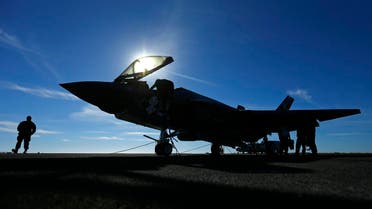 A Lockheed Martin Corp's F-35C Joint Strike Fighter is shown on the deck of the USS Nimitz aircraft carrier after making the plane's first ever carrier landing using its tailhook system, off the coast of California, November 3, 2014. (Reuters)