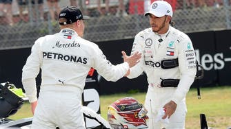 Hamilton takes pole position at German GP; Ferrari struggles