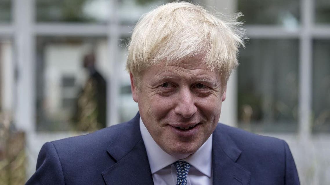 Britain’s Prime Minister Boris Johnson gestures as he meets graduates of West Midlands Police training centerin Birmingham, central England on July 26, 2019. (AFP)