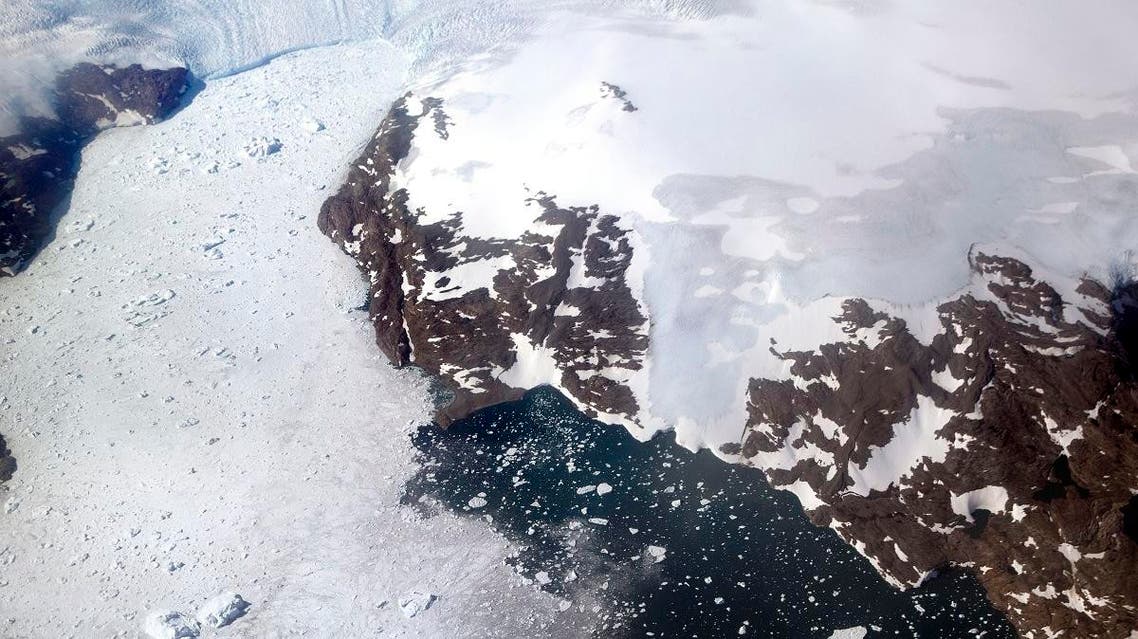 File photo of a glacier at left calves icebergs into a fjord off the Greenland ice sheet in southeastern Greenland. (AFP)