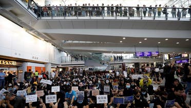 Protesters and members of the aviation industry stage a protest against the recent violence in Yuen Long, at Hong Kong airport, China, on July 26, 2019. (Reuters)