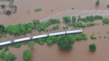 The Mahalaxmi Express train marooned in floodwaters in Badlapur, in the western Indian state of Maharashtra, on, July 27, 2019. (AP)