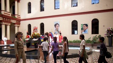 People visit the tomb of Venezuela’s late President Hugo Chavez inside the 4F military museum in Caracas, Venezuela, on July 28, 2019, on his birthday anniversary. (AP)