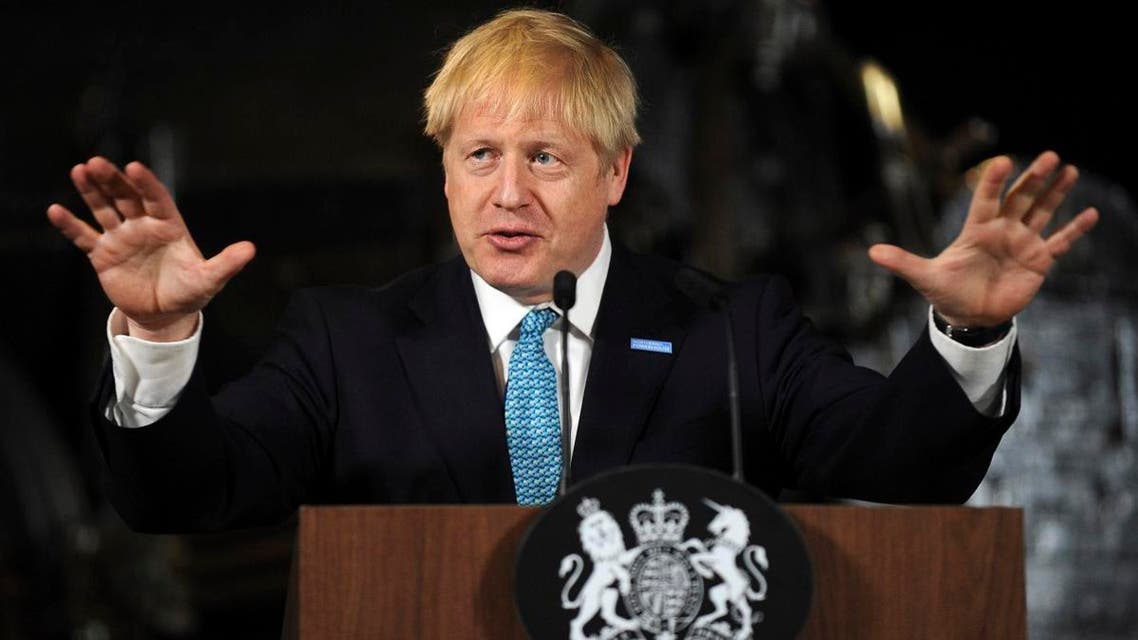 Britain’s Prime Minister Boris Johnson gestures as he gives a speech on domestic priorities at the Science and Industry Museum in Manchester, northwest England, on July 27, 2019. (AFP)