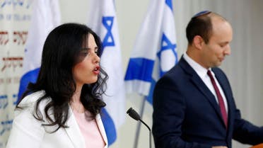 Israel's Minister of Education Naftali Bennett (R) and Israeli Justice Minister Ayelet Shaked (L) announce the formation of new political party HaYemin HeHadash or “The New Right”, during a press conference in the Israeli Mediterranean coastal city of Tel Aviv on December 29, 2018. (AFP)