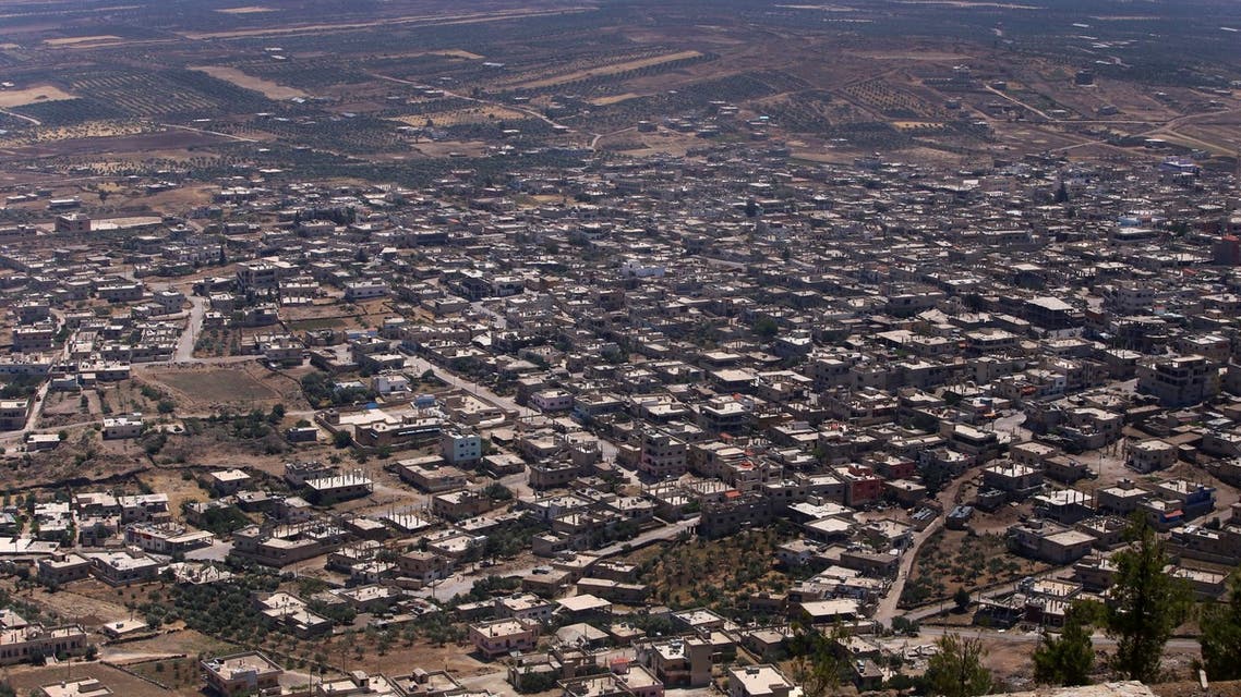 This picture shows the city of Quneitra after Syrian government forces took it back to the rebels, on July 19, 2018. Under pressure, rebels have agreed to hand over Quneitra and the buffer to government forces, an opposition negotiator and a monitoring group told AFP on July 19.
