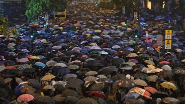  People attend a protest held by civil servants in the Central District of Hong Kong on August 2, 2019. (AFP)