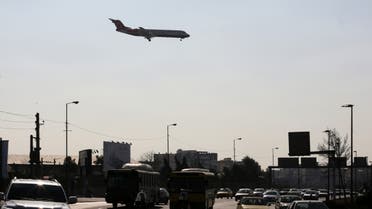 A passenger plane prepares to land at Mehrabad airport in the Iranian capital Tehran on January 18, 2016. 