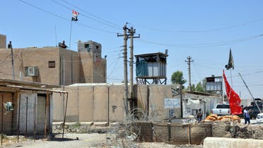 A general view shows on June 17, 2014 the Mafraq police station in Iraq's Diyala province north of Baghdad, which includes a prison where the bodies of 44 prisoners were found the night before. An overnight attack by militants was pushed back by Iraqi security forces in Baquba, Diyala's provincial capital within only 60 kilometres (37 miles) of Baghdad, leaving 44 prisoners dead at the Mafraq police station. Accounts differed as to who was responsible for the prisoner killings, with the security spokesman of Prime Minister Nuri al-Maliki saying the prisoners were killed by insurgents carrying out the attack, and other officials saying they were killed by security forces as they tried to escape. AFP PHOTO/STR