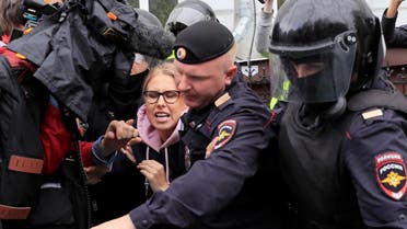 Law enforcement officers detain Russian opposition politician Lyubov Sobol before a rally calling for opposition candidates to be registered for elections to Moscow City Duma, the capital’s regional parliament, in Moscow, Russia August 3, 2019. (Reuters)