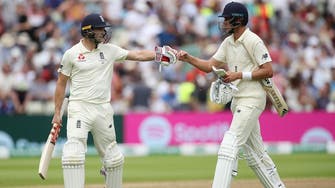 Broad and Woakes help England post first-innings lead