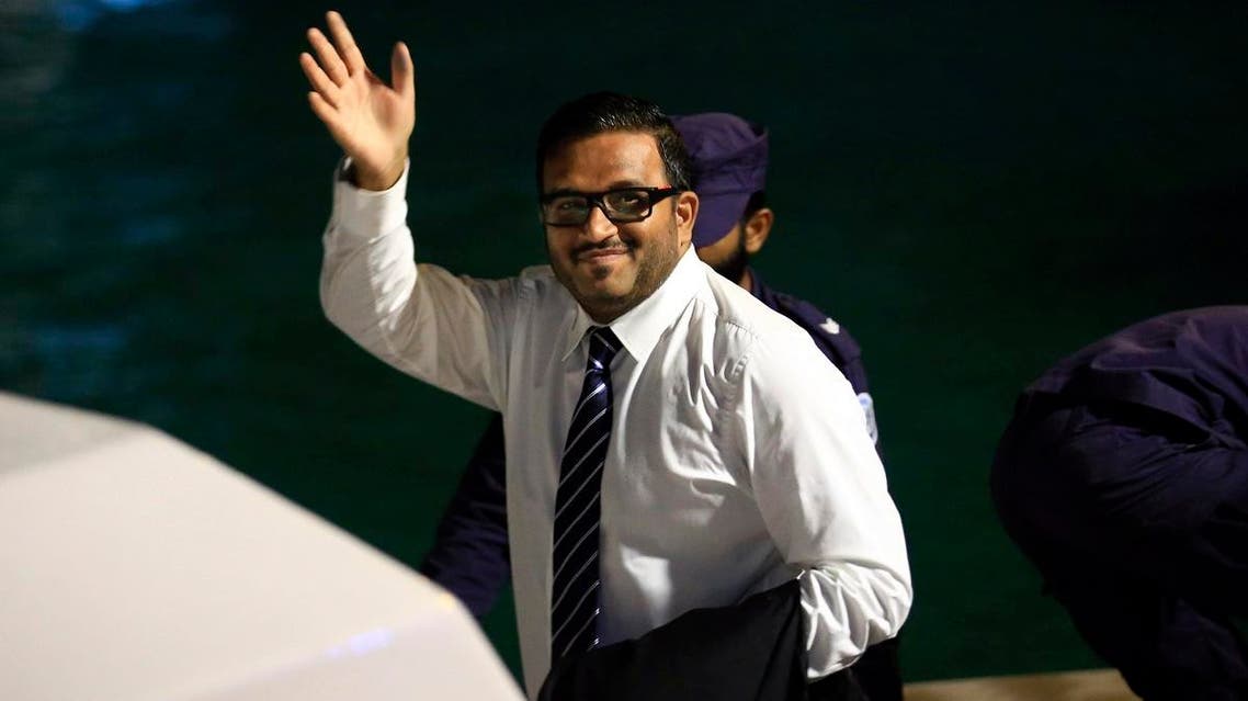 File photo of former Maldives vice president Ahmed Adeeb waves to the media before he boards a police speedboat in Maldives. (AP)