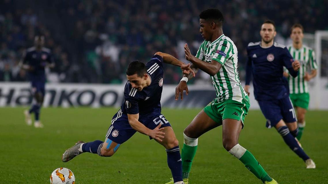 Betis’ Junior Firpo (R) during the Europa League Group F soccer match between Betis and Olympiakos at the Benito Villamarin Stadium in Seville, Spain. (File photo: AP)