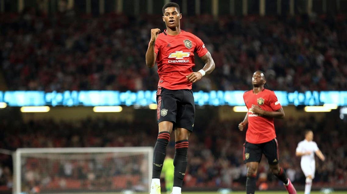 Manchester United's Marcus Rashford celebrates scoring his side's first goal of the game during the Pre-Season match between Manchester United and AC Milan. (AP)