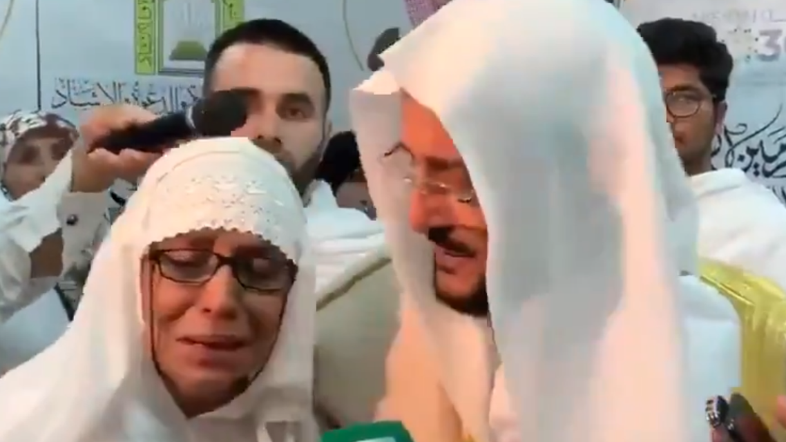 Saudi minister comforting Christchurch victim’s wife - screengrab