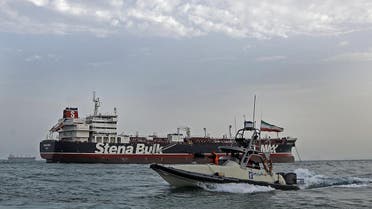 A picture taken on July 21, 2019, shows Iranian Revolutionary Guards patrolling around the British-flagged tanker Stena Impero as it's anchored off the Iranian port city of Bandar Abbas. (AFP)