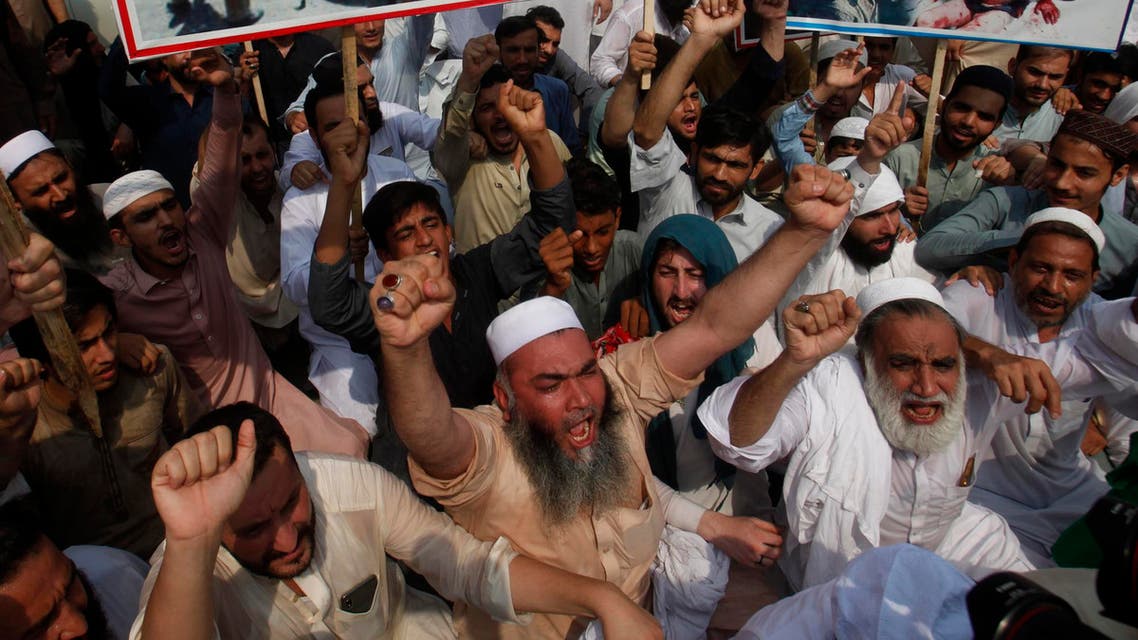 People attend a rally to protest India's policy on Kashmir, in Peshawar, Pakistan, Tuesday, Aug. 6, 2019. (AP)