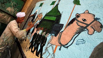 Egyptian artist paints murals on houses to celebrate Hajj