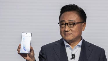 DJ Koh, president and CEO of Samsung Electronics, presents the Samsung Galaxy Note 10 smartphone during a launch event at Barclays Center on August 7, 2019 in the Brooklyn borough of New York City. (AFP)