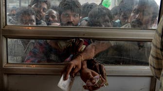 Hundreds of poor migrant workers flee Kashmir under lockdown