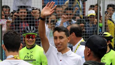 Tour de France winner Egan Bernal waves to the crowd as he is welcomed home to Zipaquira, Colombia. (AP)