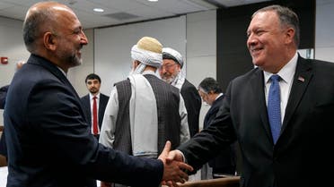 Secretary of State Mike Pompeo shakes hands with Hanif Atmar, Afghan Presidential Candidate and former National Security Adviser, during a meeting with Afghan politicians, on June 25, 2019, in Kabul, Afghanistan. (AFP)