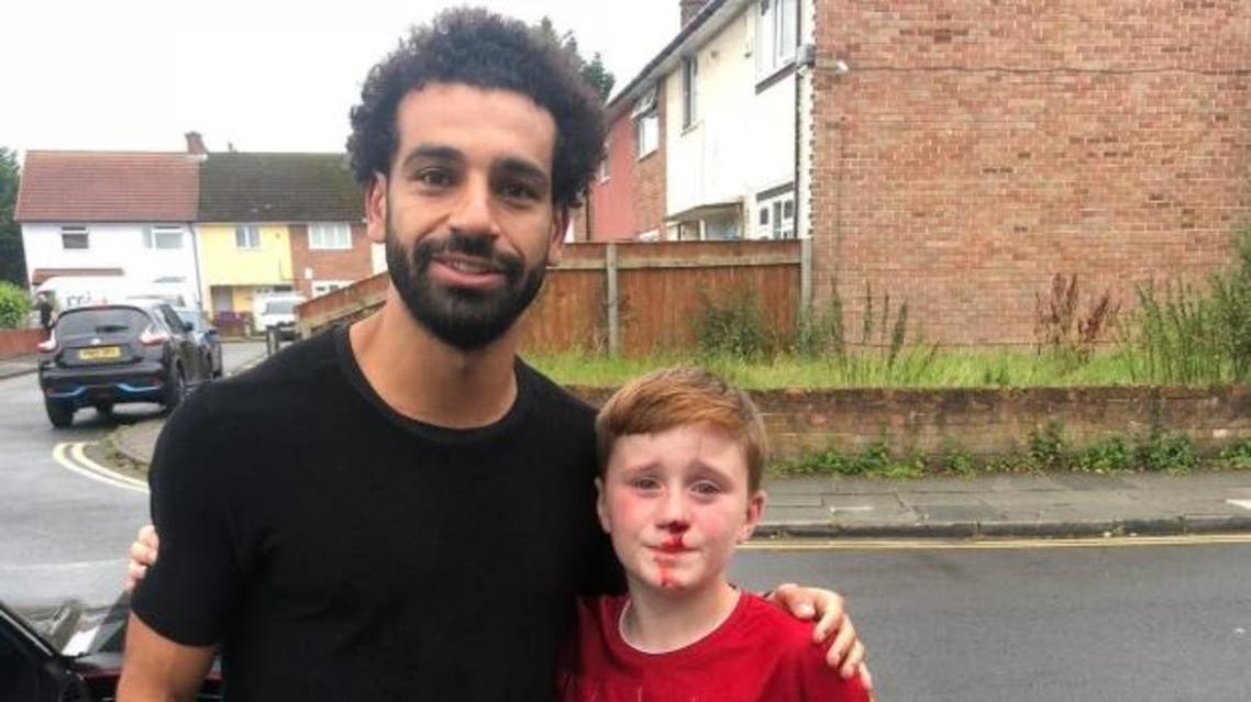 Mohamed Salah and young Liverpool fan. (Twitter)