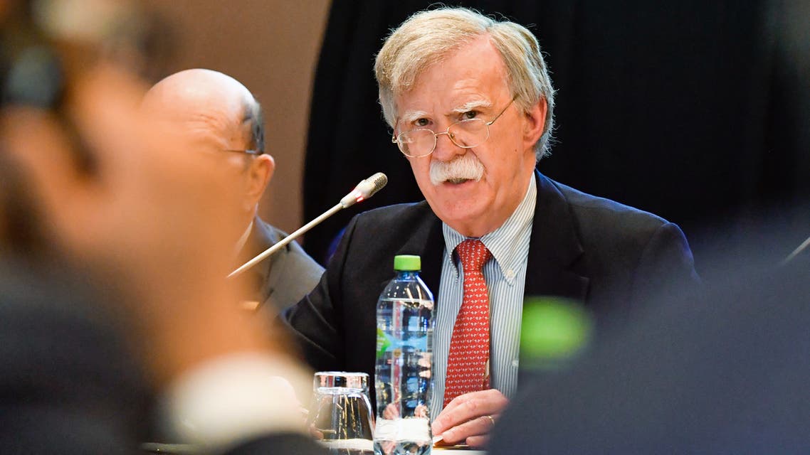 Handout photo released by the Peruvian Ministry of Foreign Affairs of US President Donald Trump's National Security Advisor, John Bolton, speaking during the International Conference for Democracy in Venezuela in Lima on August 6, 2019. Washington warned third parties on Tuesday to avoid doing business with the Venezuelan regime of Nicolas Maduro, as delegates from some 60 countries met in Lima to discuss ways of ending the crisis in South American nation.
