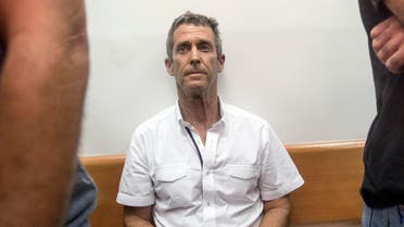 French-Israeli diamond magnate Beny Steinmetz sits at the Israeli Rishon Lezion Justice court, near Tel Aviv on August 14, 2017 after he was detained as part of an international money laundering investigation, authorities said. (AFP)