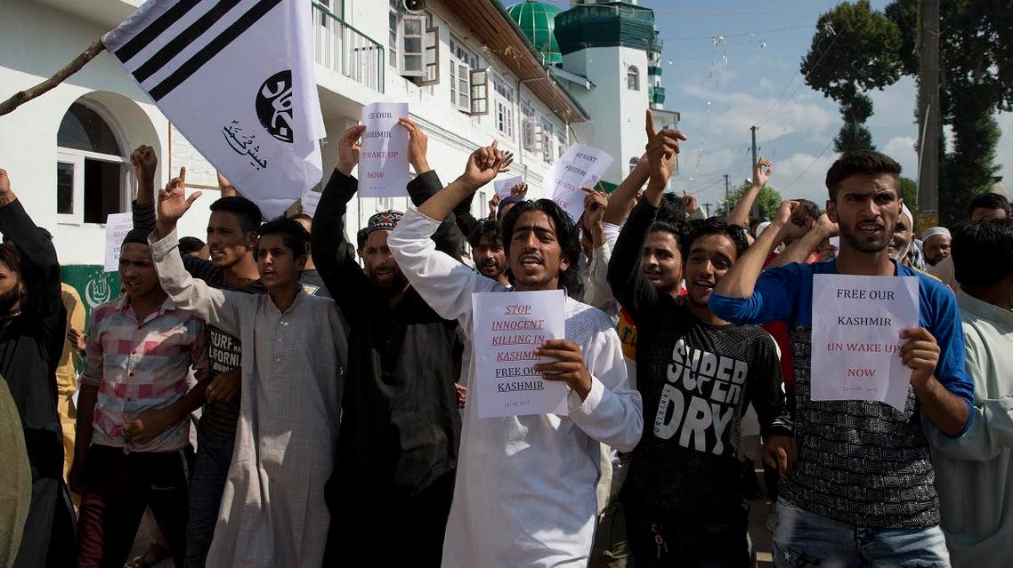 Kashmiri Muslims shout slogans during a protest after Eid prayers in Srinagar, Indian-controlled Kashmir, on August 12, 2019. (AP)