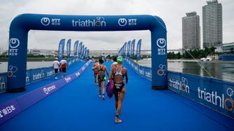Olympic triathlon test event in Tokyo shortened over extreme heat fears