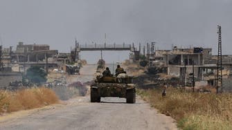 Syrian troops close to western outskirts of opposition-held town