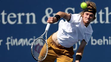 Andrey Rublev of Russia serves to Roger Federer of Switzerland during Day 6 of the Western and Southern Open at Lindner Family Tennis Center on August 15, 2019, in Mason, Ohio. (AFP)