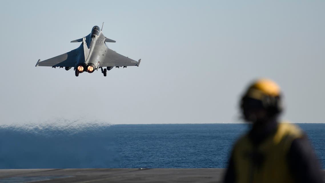 A French Rafale fighter jet takes off from the deck of France's aircraft carrier Charles-de-Gaulle operating in the eastern Mediterranean Sea on December 9, 2016, as part of an international coalition against the Islamic State (IS) group.