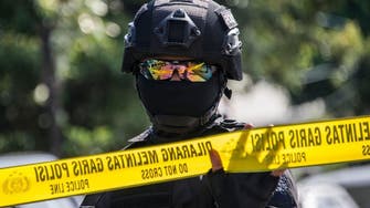 Indonesian police shoot suspected militant after officer slashed