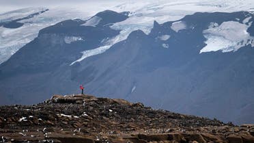 A man stops on his way to the top of what once was the Okjokull glacier, in Iceland. (AP)