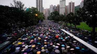 Anti-extradition bill protesters march to demand democracy and political reforms, in Hong Kong. (Reuters)