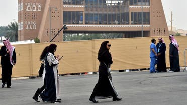 Saudi women walk pior to the 2018 Saudia Ad Diriyah E-Prix Formula E Championship in Riyadh. (File photo: AFP)