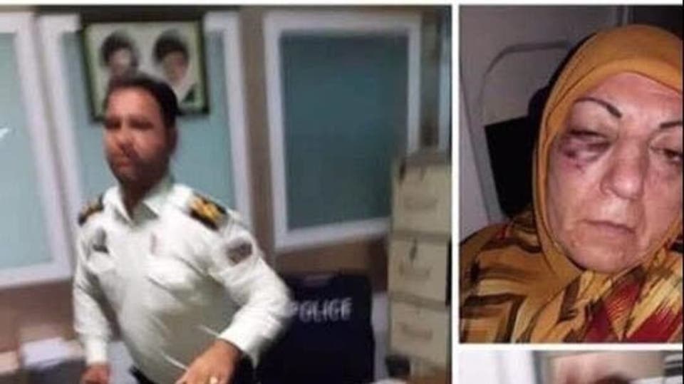 ضابط إيراني يضرب سيدة عراقية
