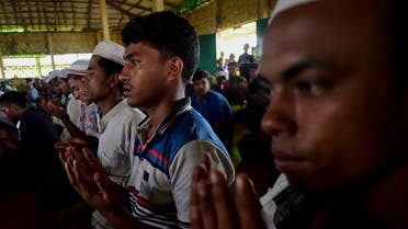 Rohingya Muslim refugees offer their Friday prayers at a mosque in the Kutupalong refugee camp in Ukhia district in Bangladesh on August 23, 2019. (AFP)
