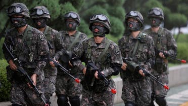 South Korean army soldiers walk after an anti-terror drill as a part of Ulchi Freedom Guardian exercise at National Assembly in Seoul, South Korea, Wednesday, Aug. 23, 2017. (AP)
