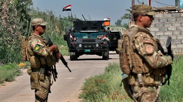 Iraqi security forces conduct a search operation in Taramiyah, 50 kilometers ( 31 miles) north of Baghdad, Iraq, Tuesday, July 23, 2019. (AP)