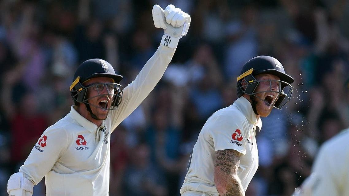 England's Ben Stokes (R) and England's Jack Leach react after England won the third Ashes cricket Test match between England and Australia at Headingley in Leeds, northern England, on August 25, 2019. (AFP)