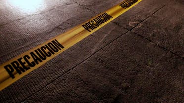 A police tape surrounds the crime scene where a man was killed in Tijuana, Mexico, late Monday, Aug. 10, 2009. (AP)